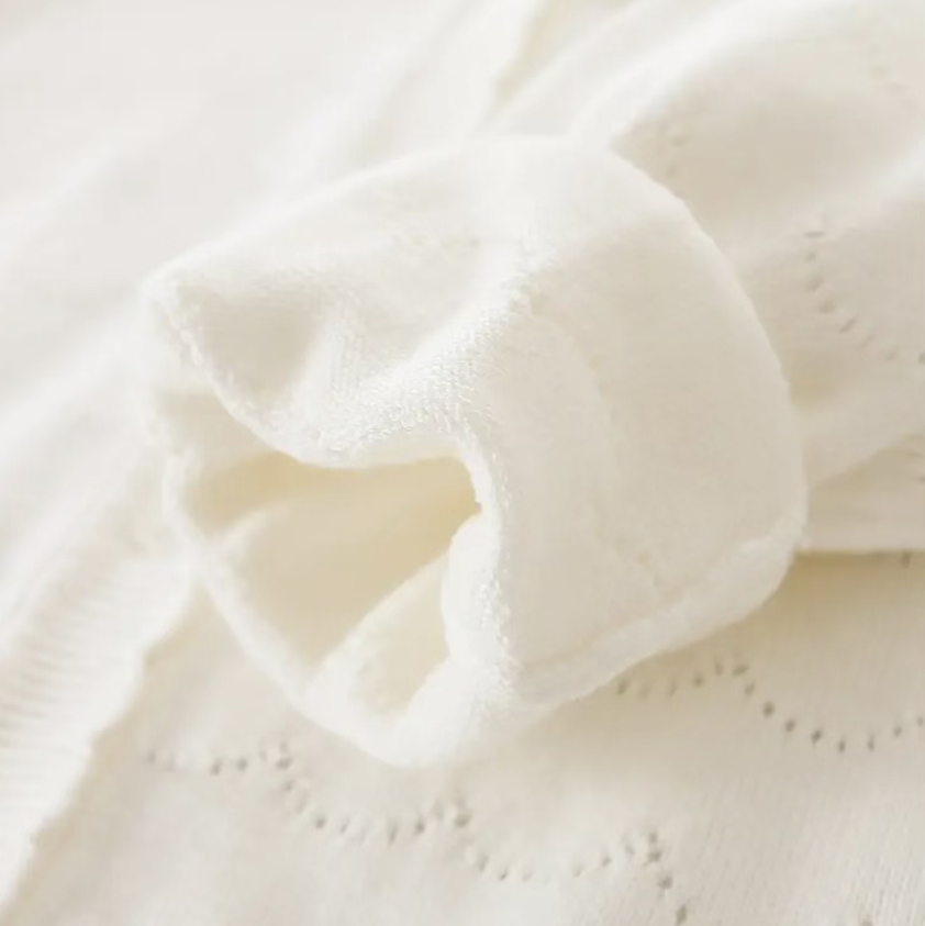 Baby clothes hanging on line